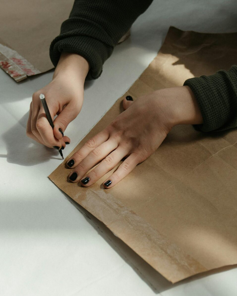 Fashion designer managing apparel production
